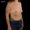 Frontal view of patient before breast augmentation with naturally small breast size.
